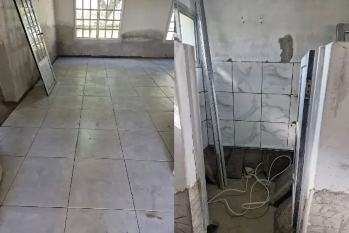 Obreros trabajando en la refacción del nivel inicial de la escuela N° 4 de San José de Feliciano